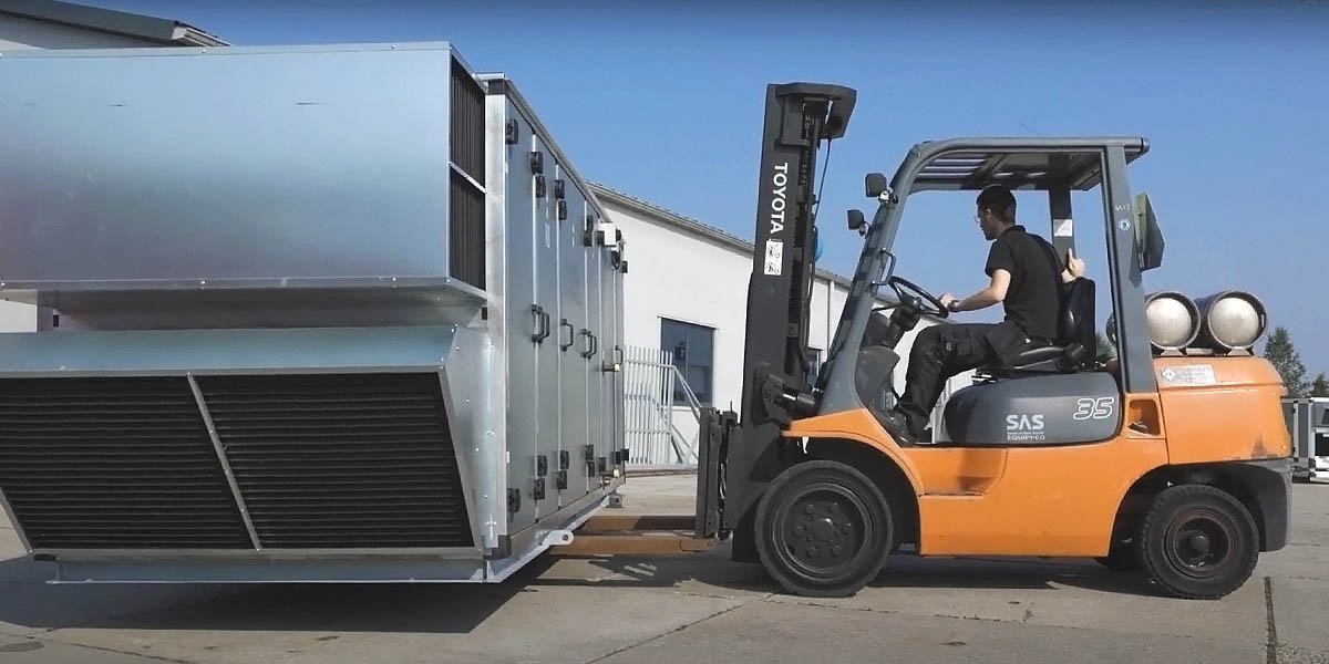 Commercial air duct cleaning - picking up a huge commercial HVAC system